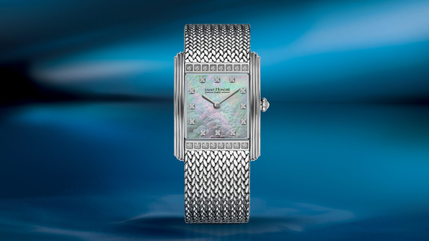 Palais Royal beautifully echoes an era in Parisian history, mirroring the artistic marvels and architectural wonders, while subtly hinting a contemporary touch. 
Resembling the 17th century emblematic monument - the timepiece presents itself in a classic square case set with dazzling diamonds evoking quiet sophistication. Fashioned with a jewelry mesh bracelet and complemented by a mother of pearl dial, experience class with every wear.  

Palais Royal – once the heartbeat of the capital, now beats through this majestic watch – dipped in true royal beauty.